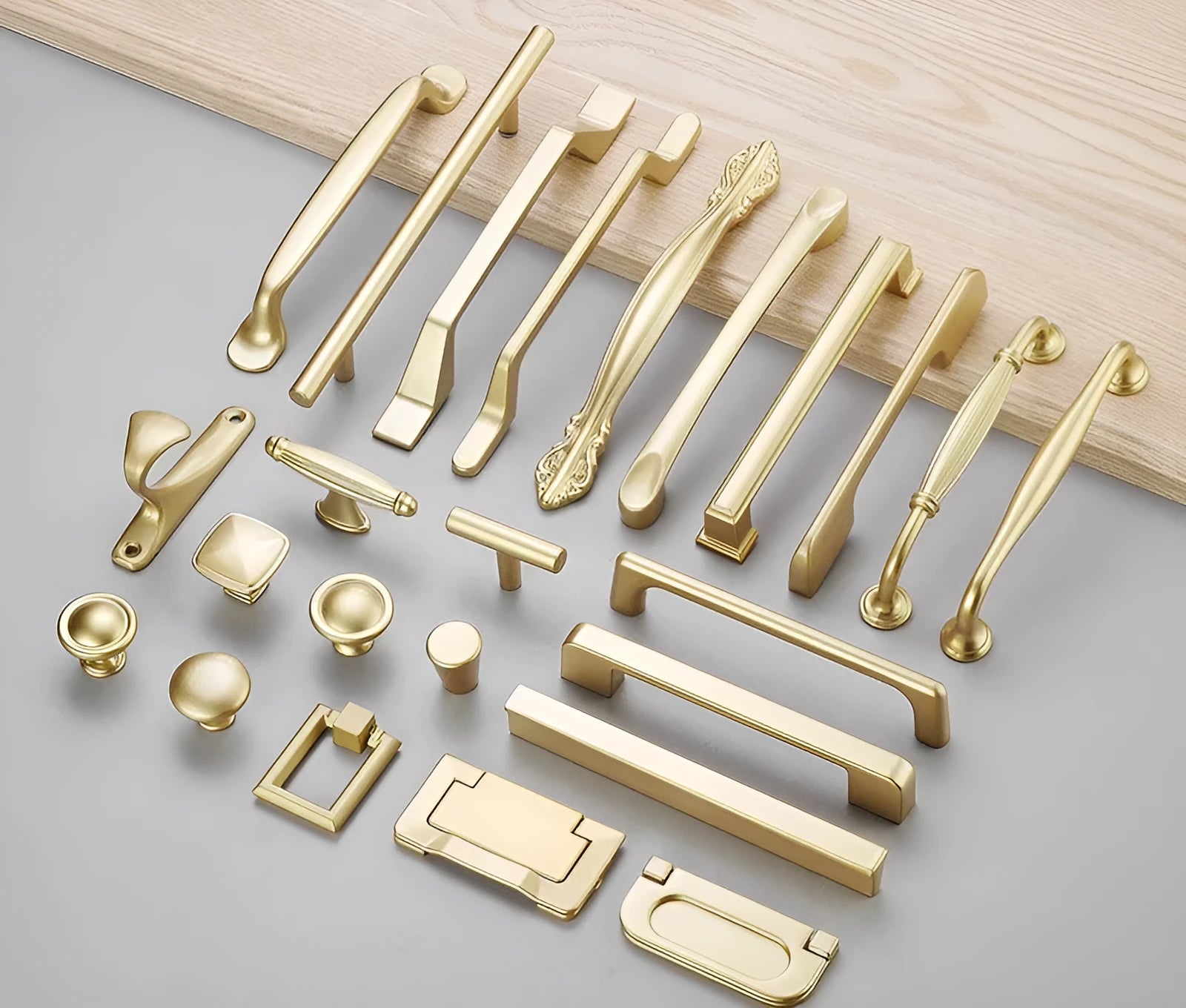 Gold T-shaped aluminium alloy single-hole cabinet handle showing three size options.