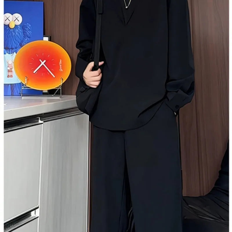 Men's black slim fit long sleeve polo shirt and matching trousers casual two-piece set.