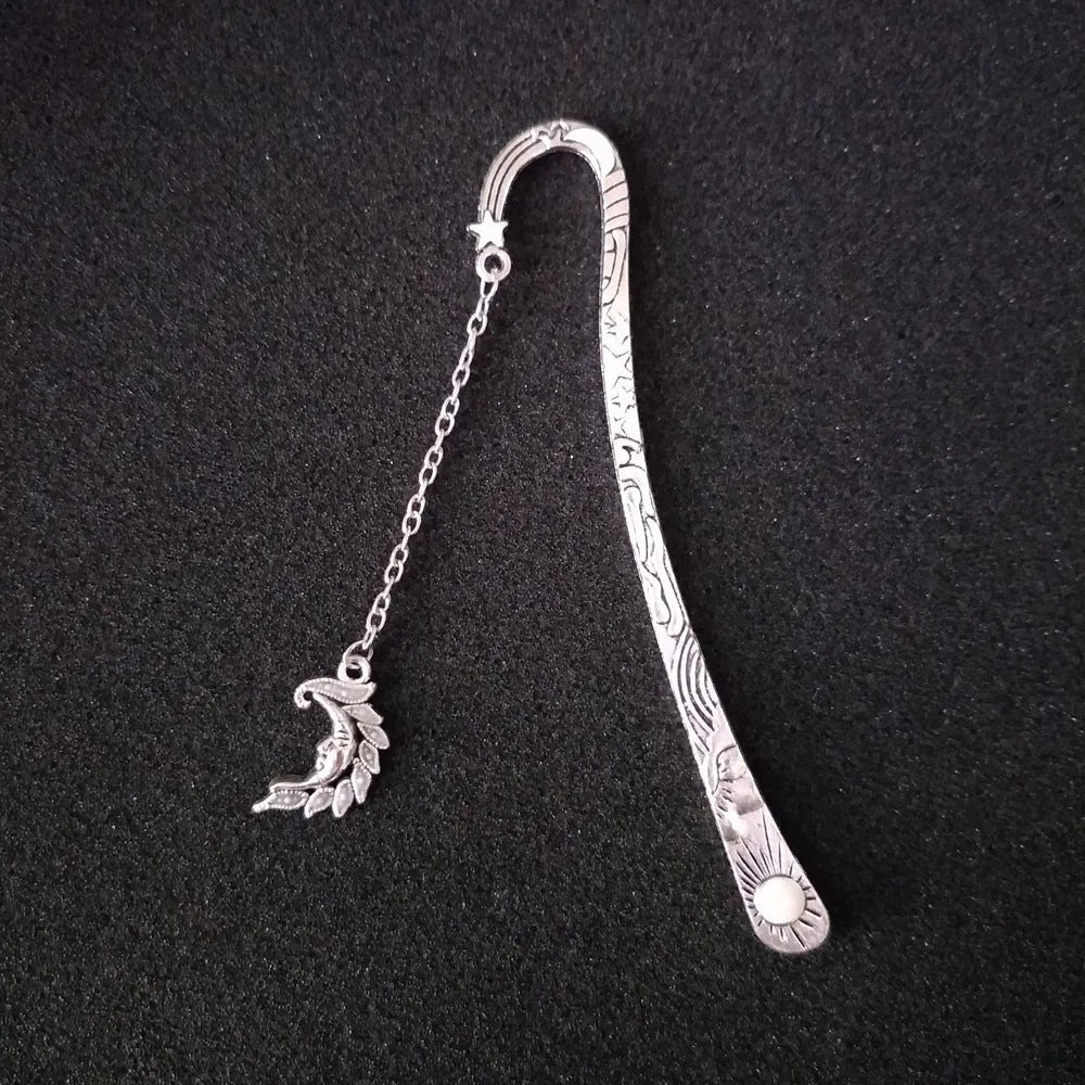 Retro celestial metal bookmark with glow-in-the-dark five-pointed star and sun moon stars design