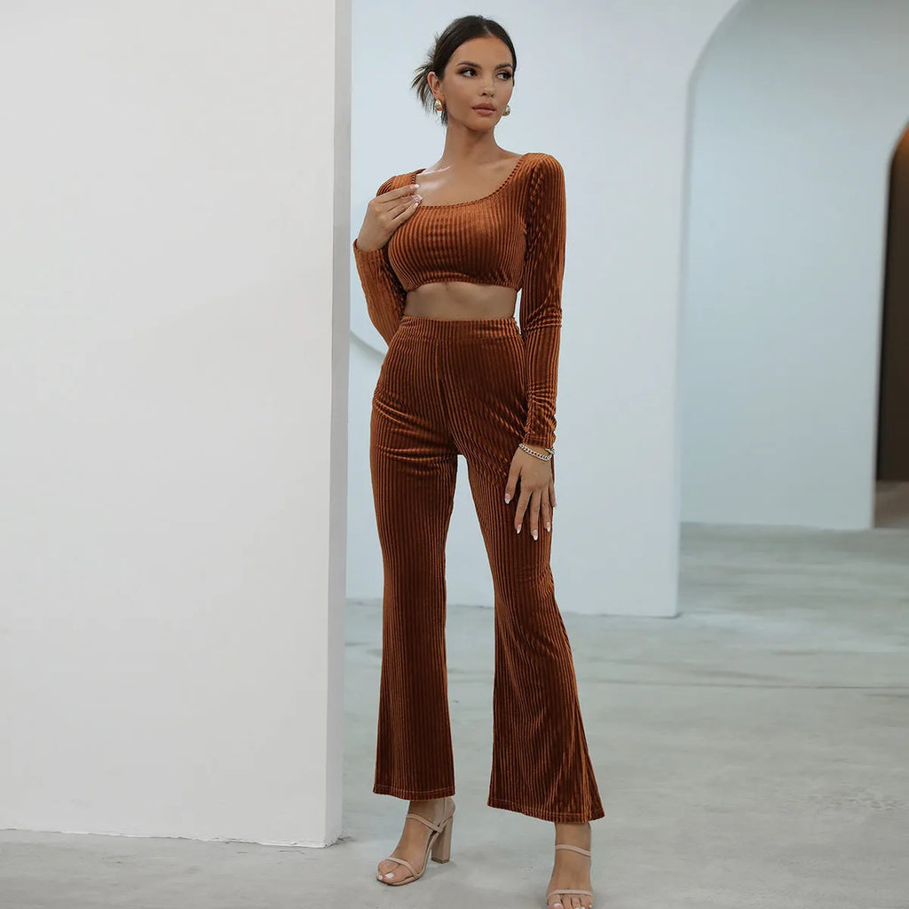 Caramel coloured long sleeve sweater and trouser casual set laid flat