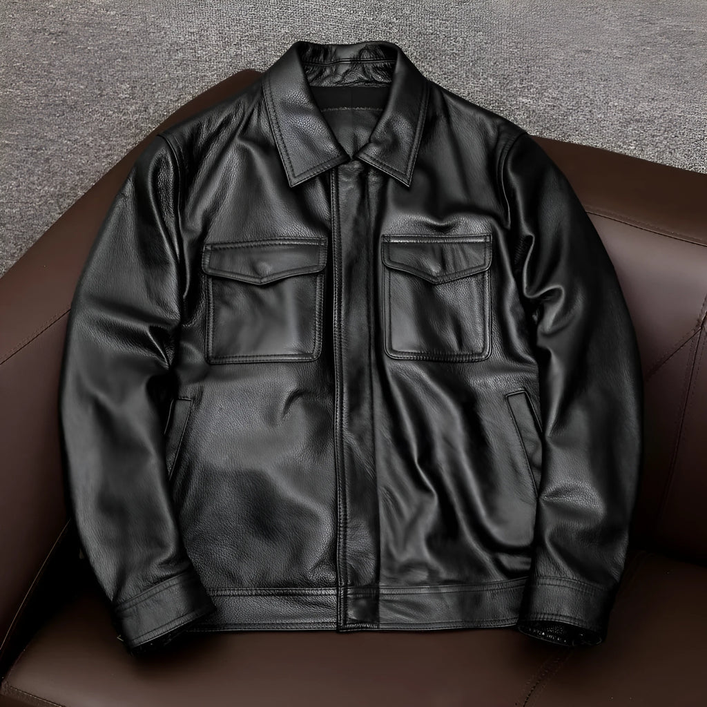 Men's plus size black retro lapel short leather jacket with side pockets on a model.
