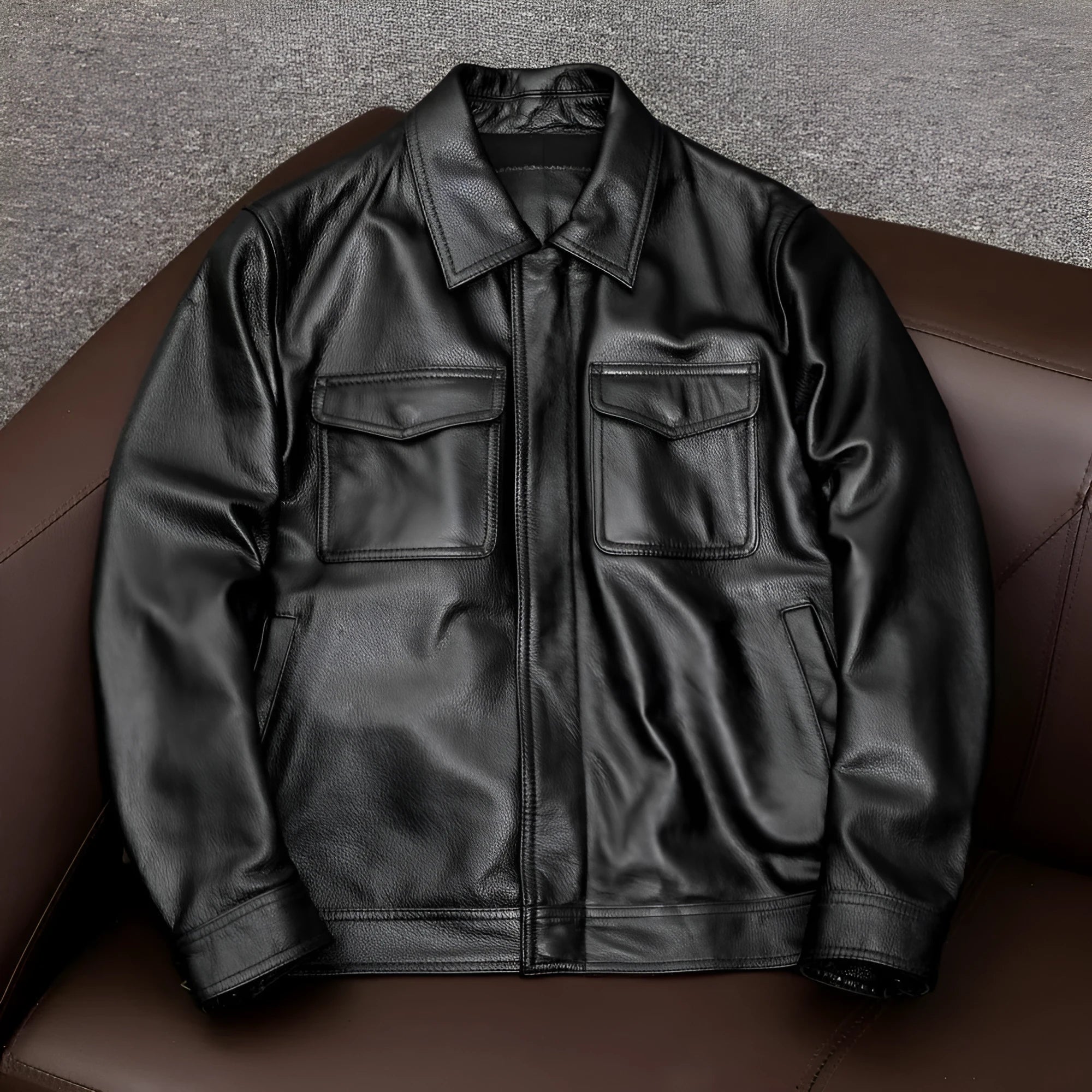 Men's plus size black retro lapel short leather jacket with side pockets on a model.