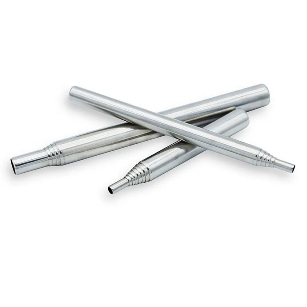Stainless steel outdoor fire blowing stick on a picnic table with camping gear
