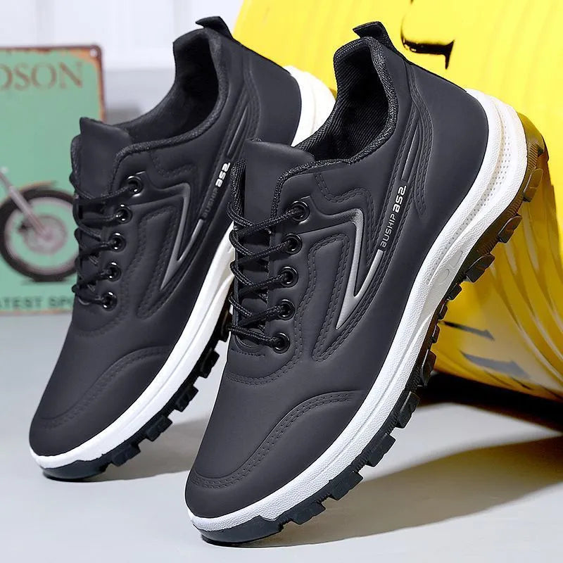 Waterproof leisure sports shoes in black and grey colour with artificial PU upper and plastic sole