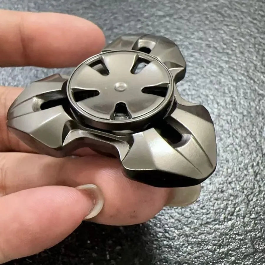 Alloy metal decompression gyro toy spinning on fingertips in gun colour finish