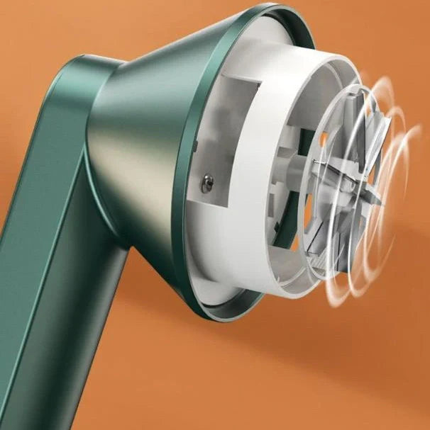 Green and white USB-powered fabric shaver device for removing pilling from clothing