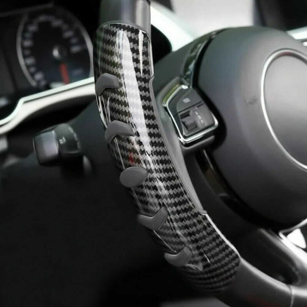 Carbon fibre black woven anti-slip sleeve for a 38cm car steering wheel.