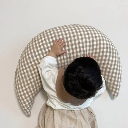 Moon-shaped baby nursing pillow in plaid cotton for newborns, available in yellow, green, and brown