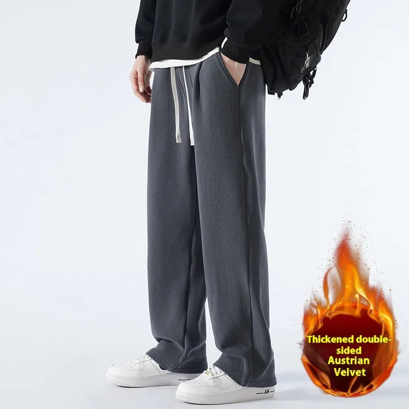 Men's double-sided polar fleece winter trousers in apricot colour showing loose Korean style and drawstring waist