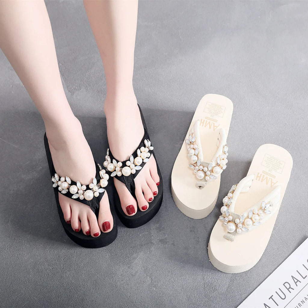 Women's high-heeled flip flops in beige and black with cotton cloth upper, showing casual summer sandal design