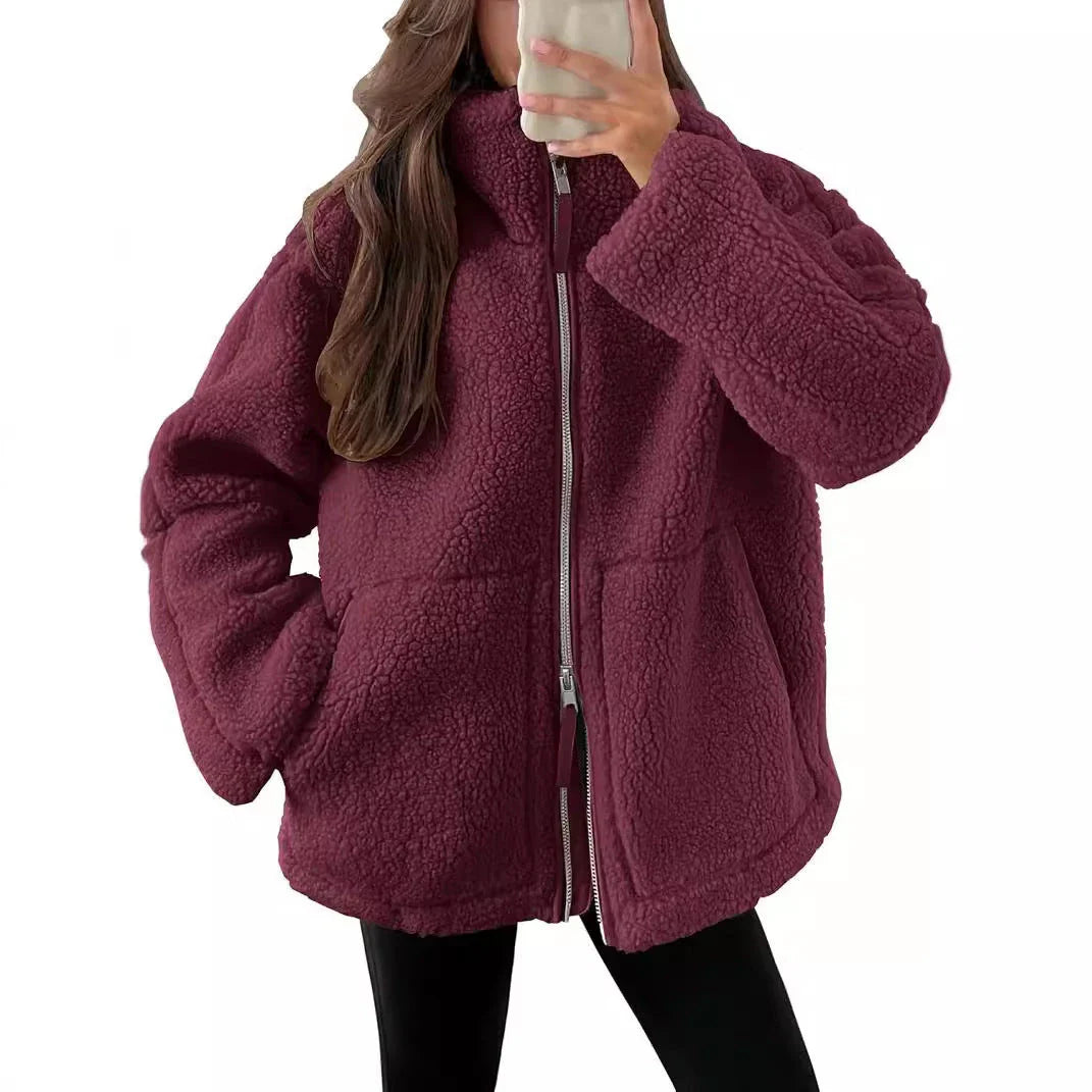 Stylish women's fleece zip-up jacket with pockets in various colours