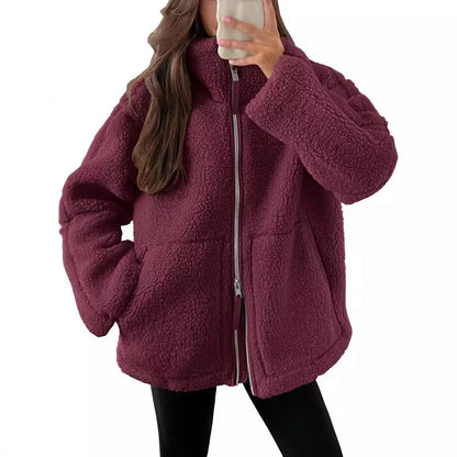 Stylish women's fleece zip-up jacket with pockets in various colours