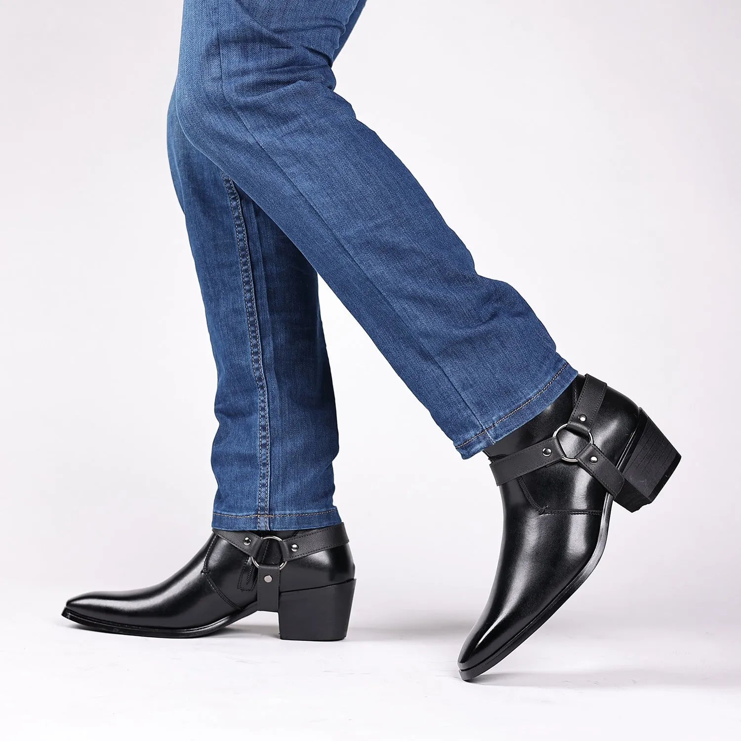 Black chain ankle boots with side zipper and horseshoe heels, square toe and rivet detailing