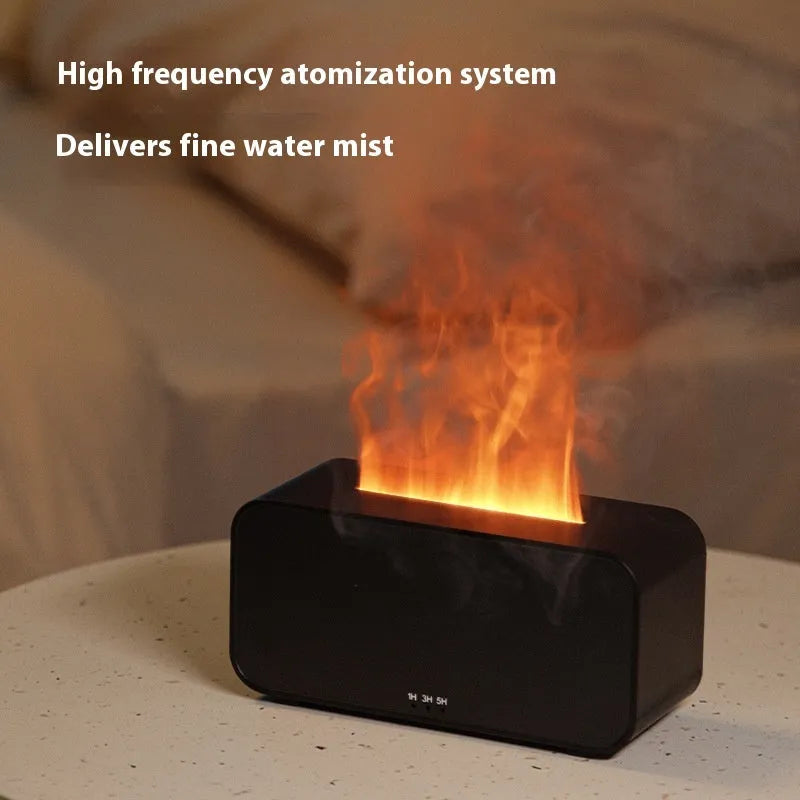 Black and white USB aromatherapy diffuser with simulated flame effect showing mist output.
