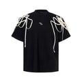 Black women's short-sleeved T-shirt with rivet ribbon padded shoulders and a loose fit.