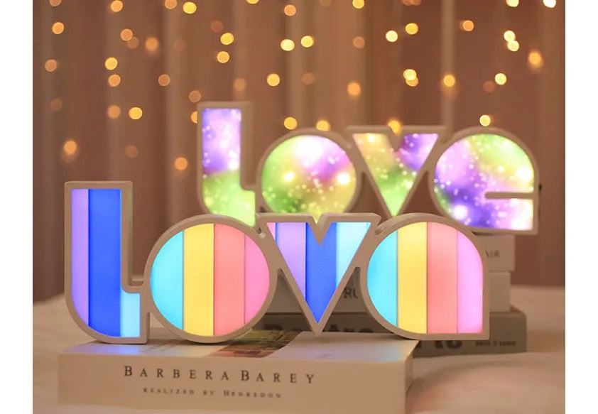 Rainbow halo style LED LOVE light sign measuring 35.5 x 13.5 cm for Valentine's Day decoration