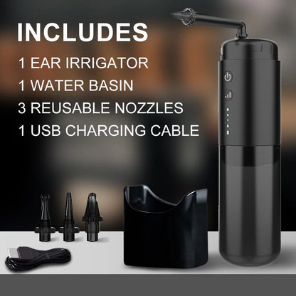 Black silicone ear washer with three nozzles and USB cable on white background