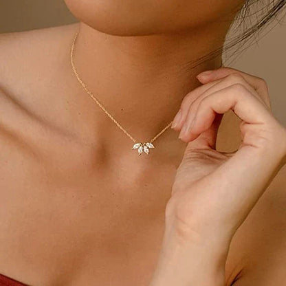 Minimalist lotus flower petal necklace in gold and silver, perfect for parties and everyday wear