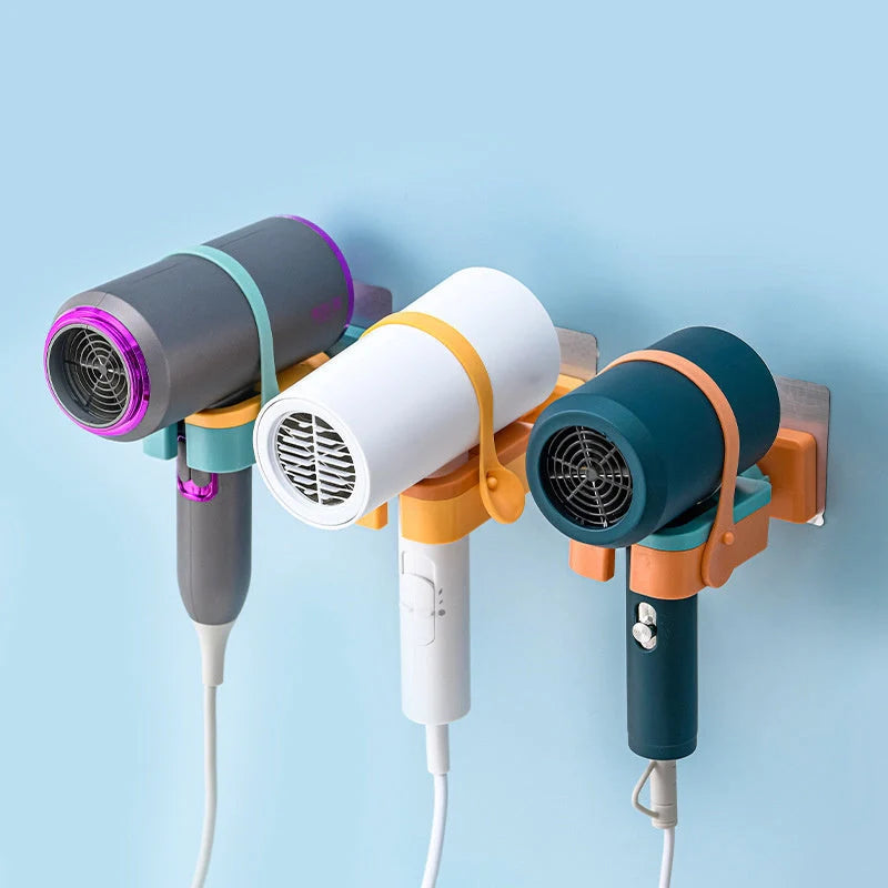 Adjustable wall-mounted hair dryer rack with silicone fixing belt in orange, pink, and green