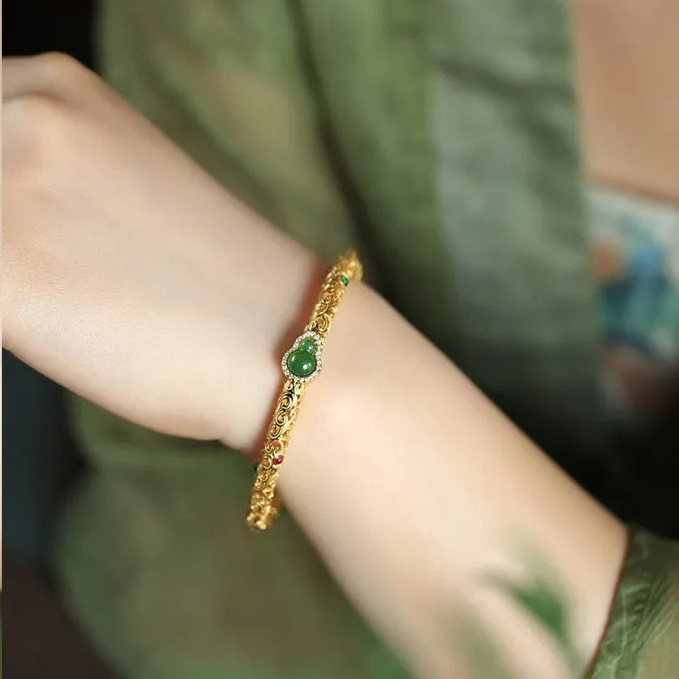 Gold-plated open xiangyun gourd charm bracelet on copper base for women