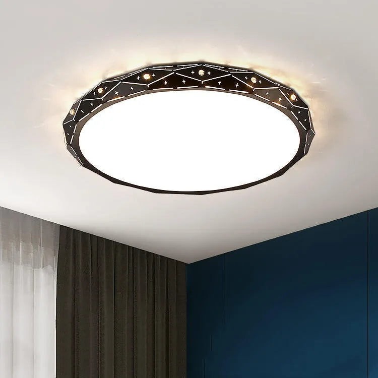 Round black iron frame LED ceiling light with dimming control on a white ceiling