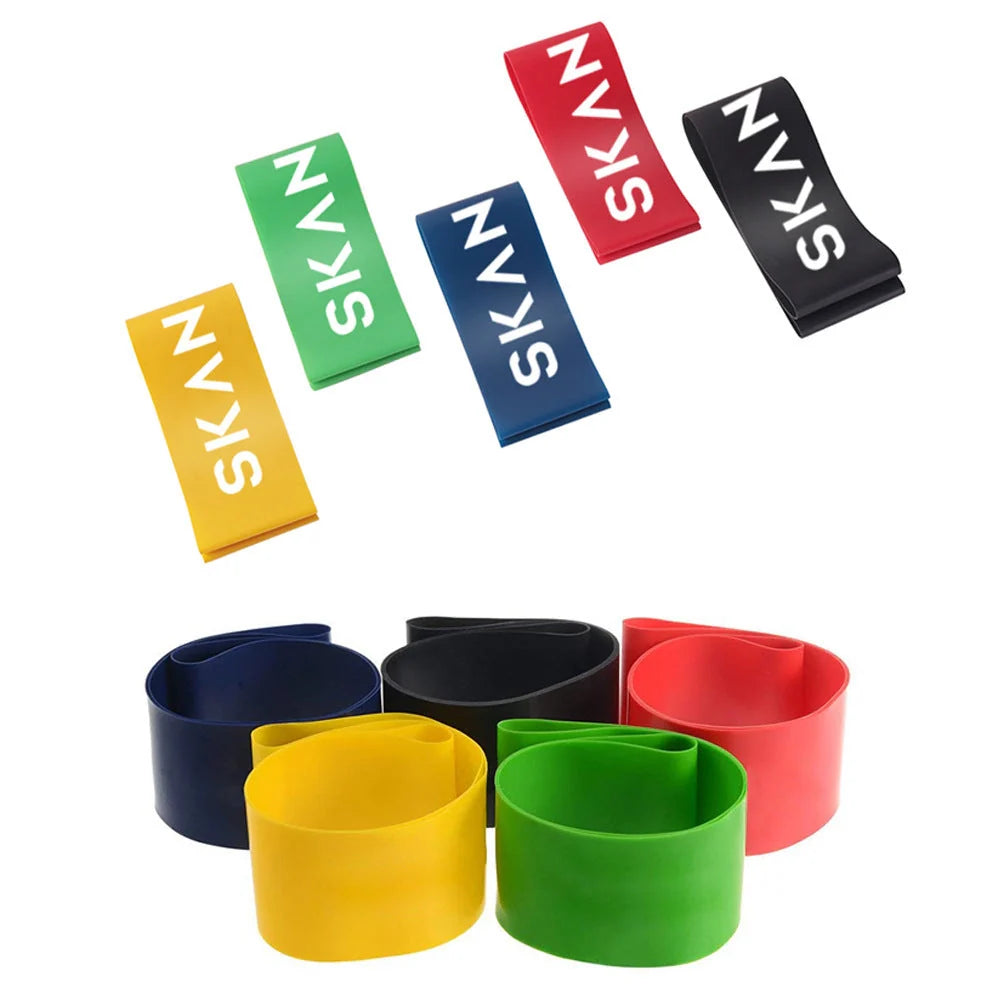 Set of five colour-coded resistance bands for yoga and fitness training, with storage bag