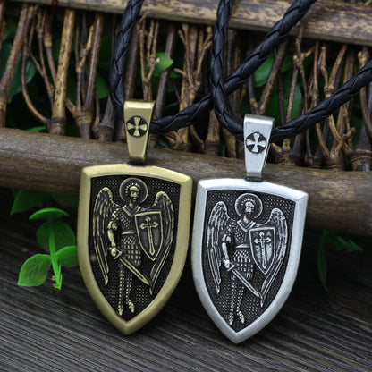 Saint Michael Archangel Pendant Necklace in ancient silver and bronze finishes with detailed cartoon character design