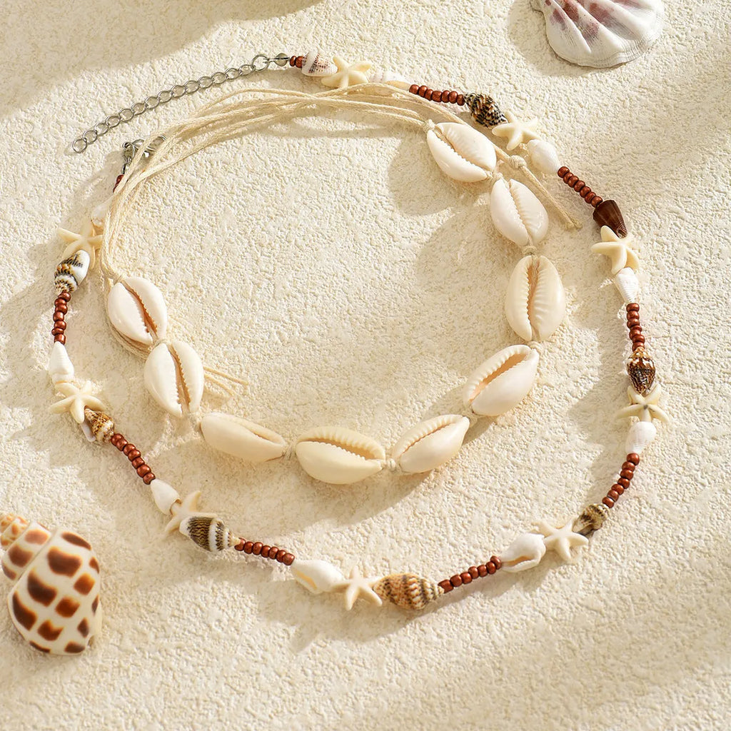 Geometric seashell pendant necklace on regular chain, colour X1900