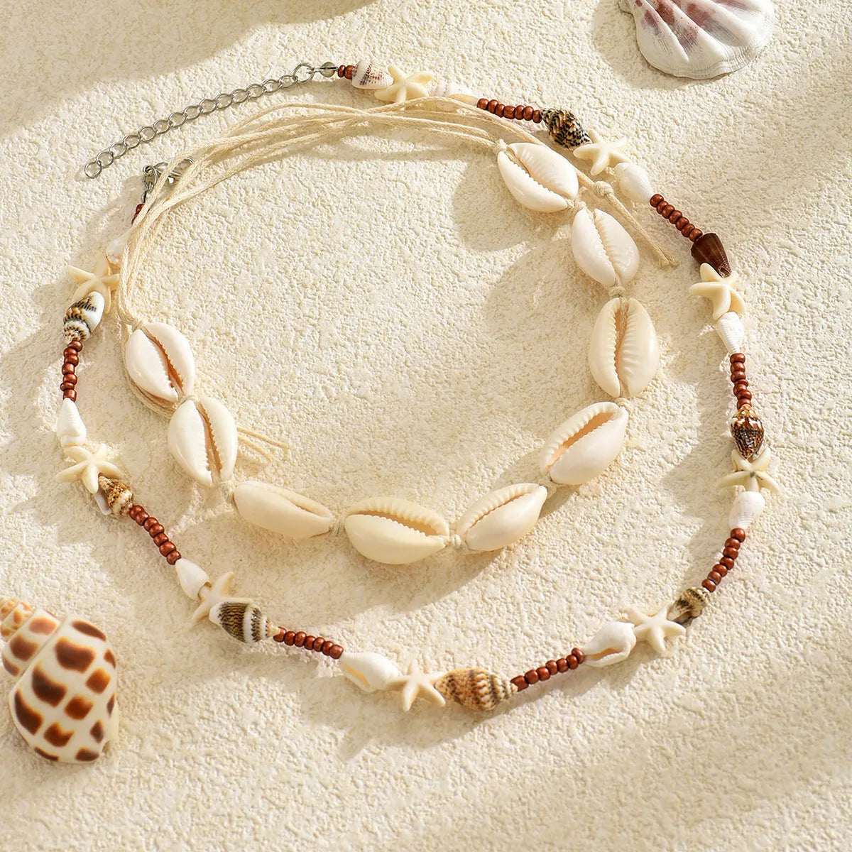 Geometric seashell pendant necklace on regular chain, colour X1900