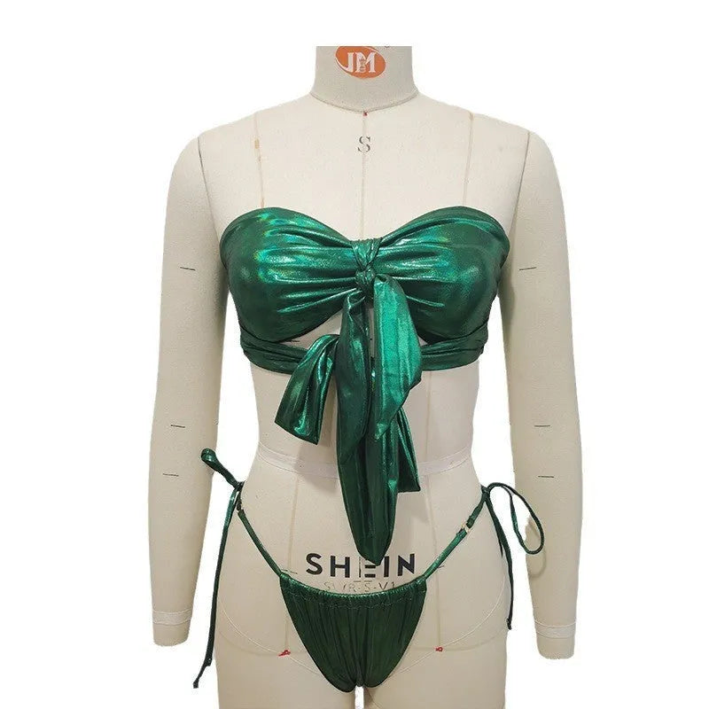 A woman's wire-free one-piece swimsuit with padded cups and lace-up sides, shown in a floral print.