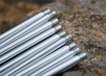 Silver aluminium camping tripod with hanging chain for outdoor barbecue cooking