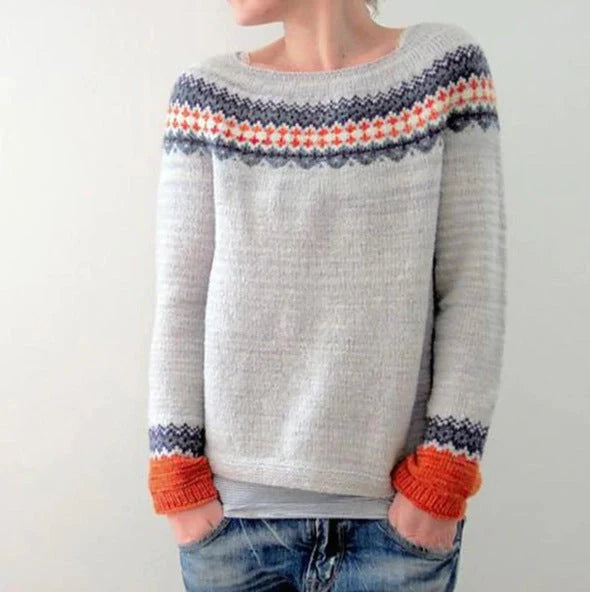Women's loose multicolor acrylic pullover sweater with round neck, available in various colours and sizes.