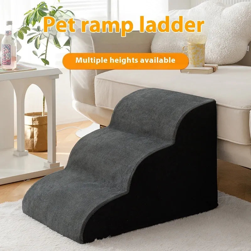 Brown wooden dog stairs with washable fabric cover next to a sofa