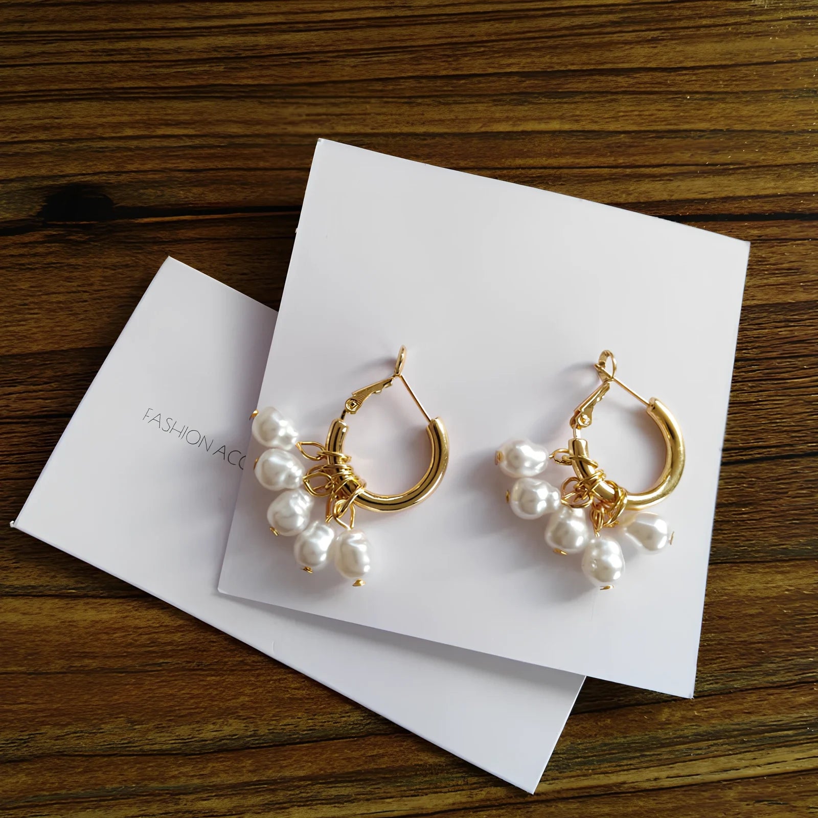 Women's gold pearl tassel earrings with geometric alloy design and electroplated finish, simple drop style for events