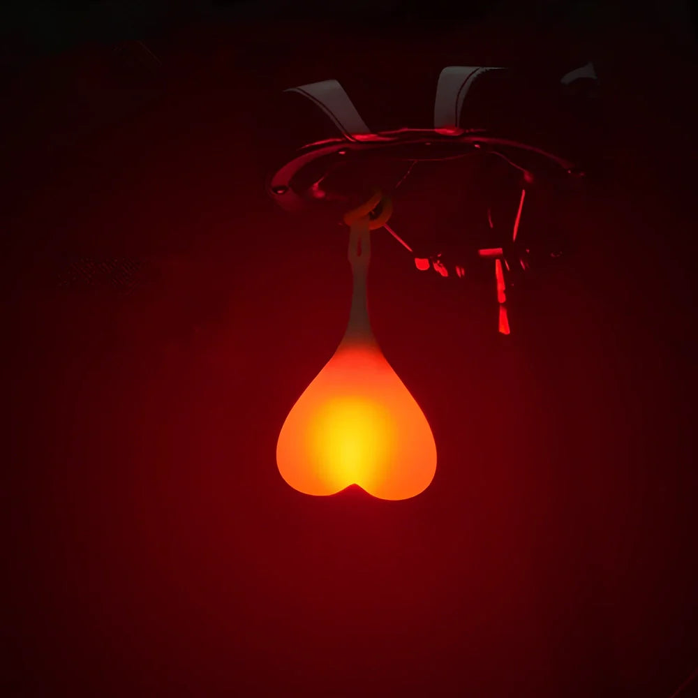 Blue beating heart silicone bike rear light, 15 cm long, touch-activated and waterproof for night cycling safety