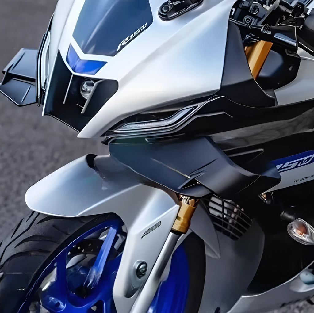 Motorcycle bodywork small wing side wing spoiler in bright black finish on a fairing