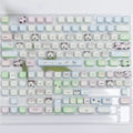 PBT sublimation keycap set showing colourful cat and puppy designs for mechanical keyboards