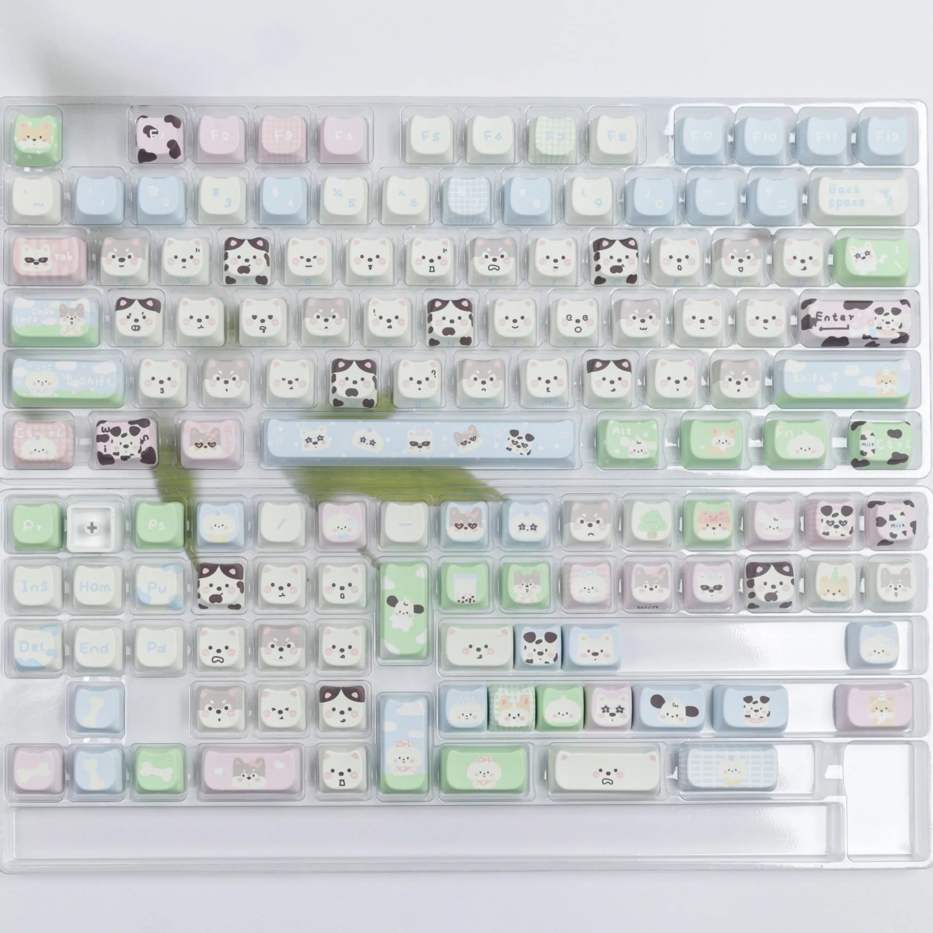 PBT sublimation keycap set showing colourful cat and puppy designs for mechanical keyboards