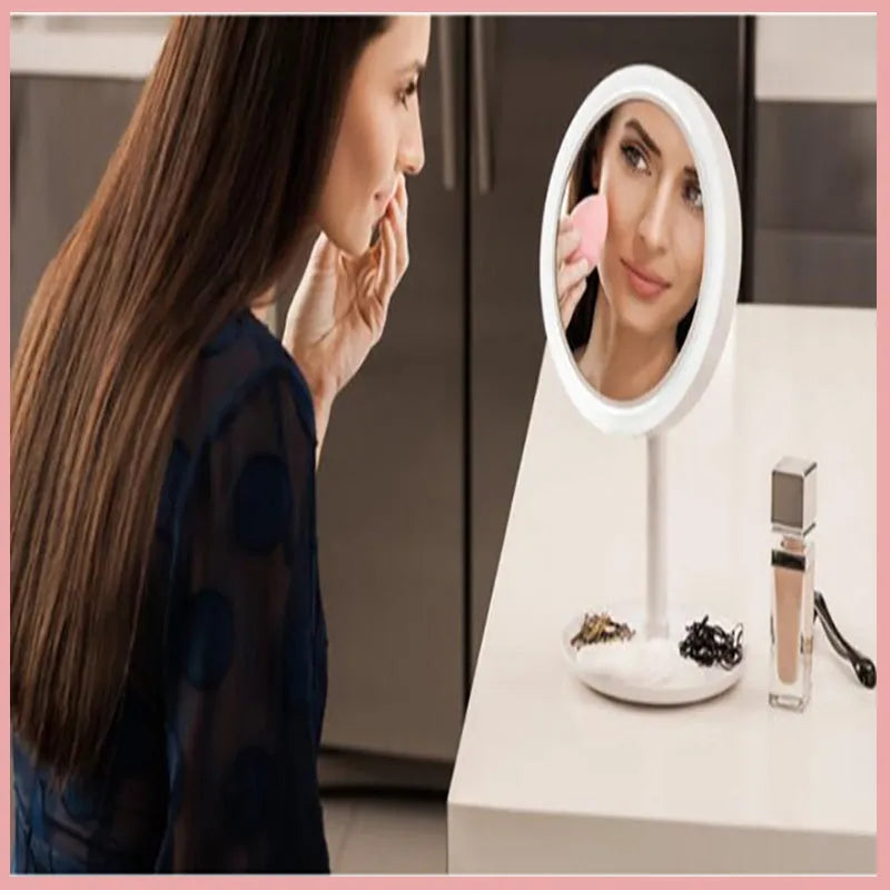 White foldable fan LED light makeup mirror on a desk with adjustable lights