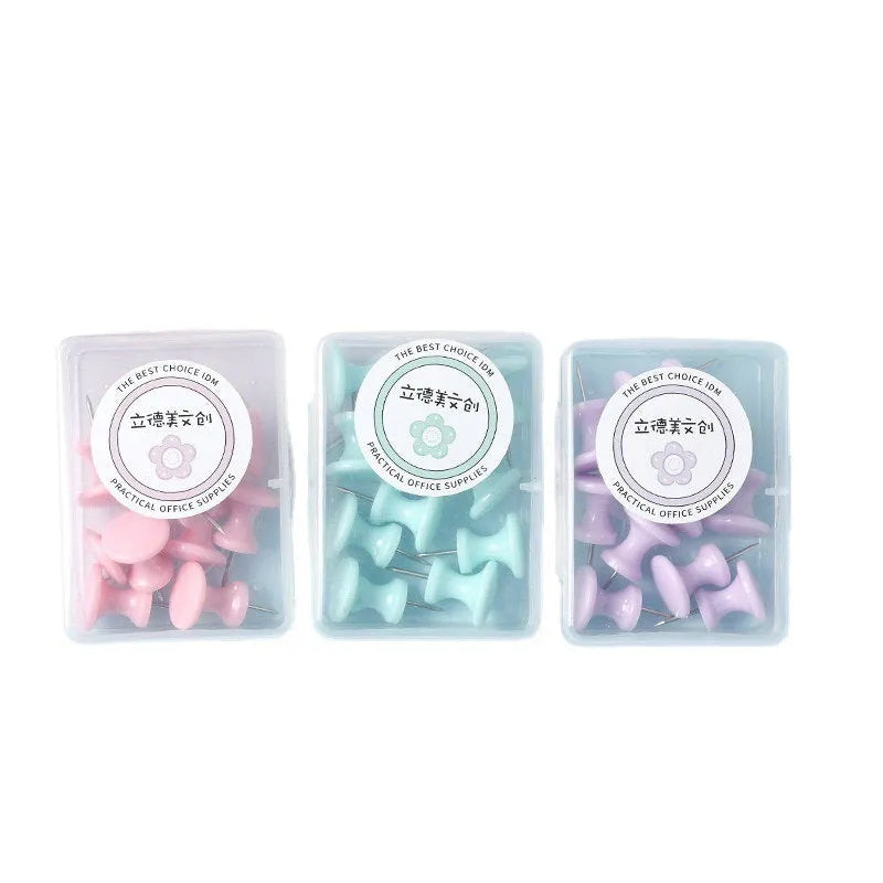 Box of 40 plastic push pins in macaron colours: cherry blossom pink, mint green and lavender.