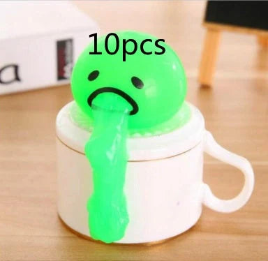 Gudetama Vomiting Egg Toy in green, orange, pink, and yellow