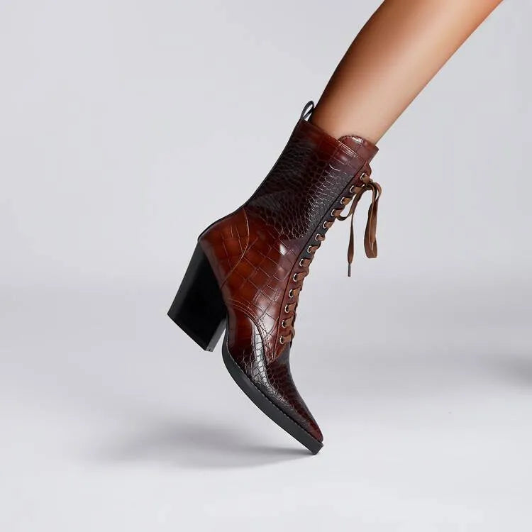 Dark brown women's ankle boot with retro stone pattern, pointed toe, and a chunky heel.