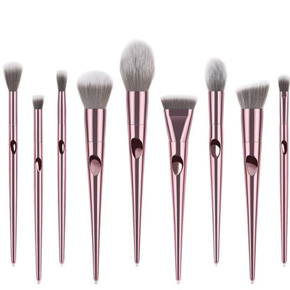 10 makeup brushes with thumbprint grips and nylon bristles in assorted sizes