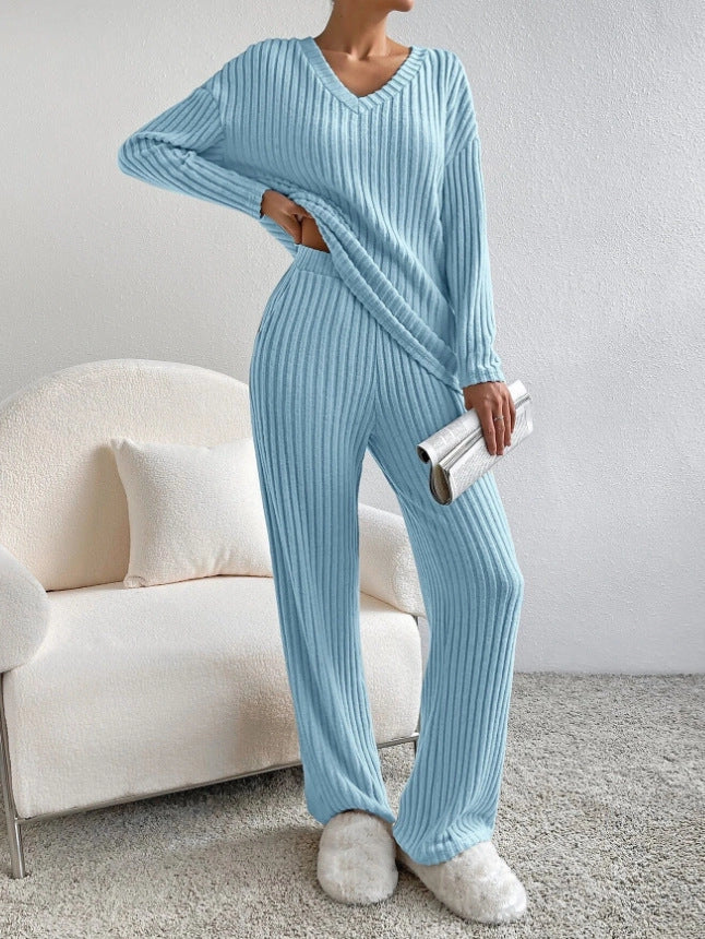 Women's polyester suit set with V-neck top and straight pants in various colours