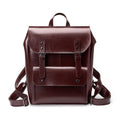Women's structured backpack in genuine cowhide leather, shown in black, brown, and coffee colour options.