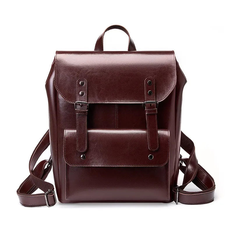 Women's structured backpack in genuine cowhide leather, shown in black, brown, and coffee colour options.
