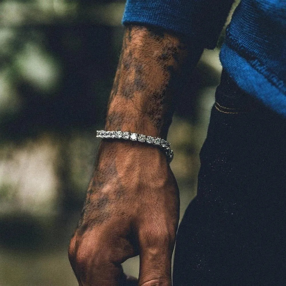 Men's hip hop bracelet with single row iced out rhinestones and zirconia tennis charm in geometric link chain design