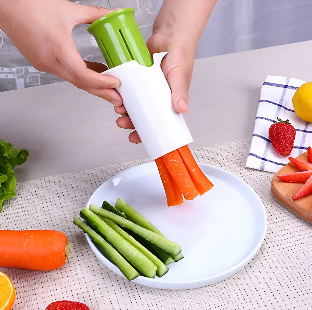 White kitchen vegetable slicer with six stainless steel blades for cucumbers and carrots.