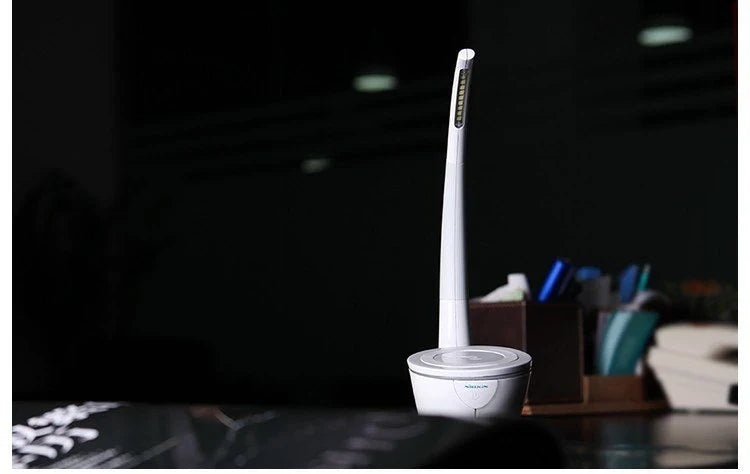 Phantom Table Lamp with wireless charging and adjustable lighting