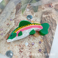 Dark green women's hair clip with detailed printed rainbow trout and carp marine design